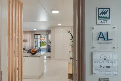 an entrance to an office with a sign on the door at Upgrade Paradise Marina in Funchal