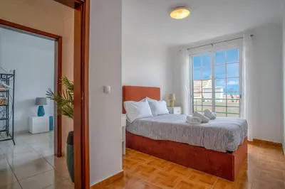 a bathroom with a toilet and a shower at Villa Alegra Paul do Mar in Paul do Mar
