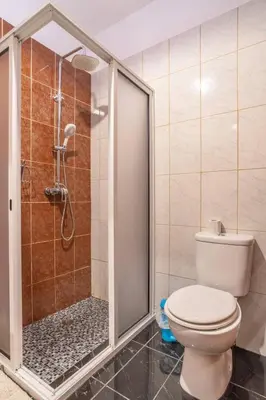 two beds sitting next to each other in a room at Villa Casanova in Arco da Calheta