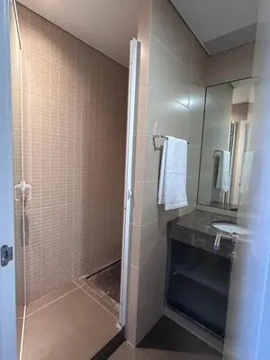 a bathroom with a shower and a sink at Ocean Sea View Apartment in Funchal
