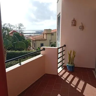 a balcony with a view of the ocean at Varandas do Funchal Apartment in Funchal