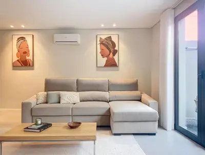 a living room with a couch and a coffee table at Ninho Memory in Funchal