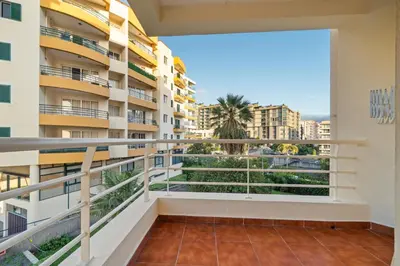 a balcony with a view of a city at Famoso Grand Stay - Free Parking in Funchal