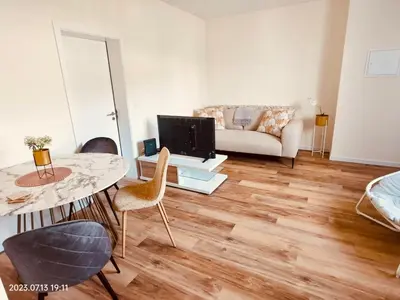 a living room with a couch and a table at Apartment with Mountain View in Funchal