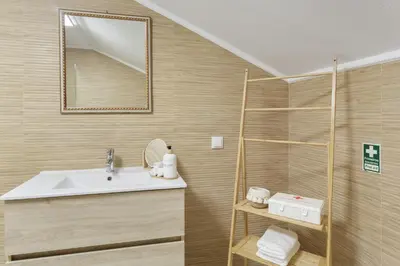 a bathroom with a sink and a shower at Sky and Sea Haven in Santa Cruz