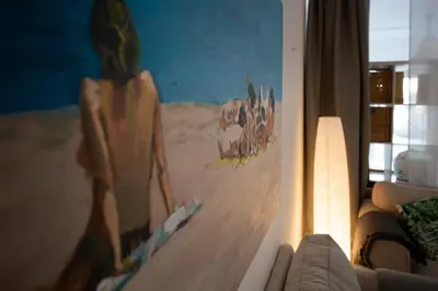 a painting on the wall of a living room at Casa Lobitos Holiday Home with Pool - Sagres in Sagres