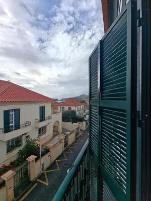 a view of a street from a balcony of a building at Mirasol Guesthouse in Funchal