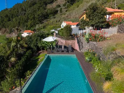 an overhead view of a swimming pool in a villa at Casa da Laranja by Holiday Rental Madeira in Tábua