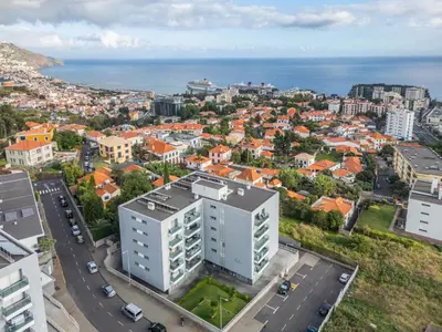 an aerial view of a city with the ocean at Studio Palace B by Homie in Funchal