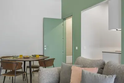 a dining room with a table and chairs at Studio Palace B by Homie in Funchal