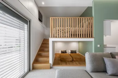 a living room with a loft bed and a staircase at Studio Palace A by Homie in Funchal
