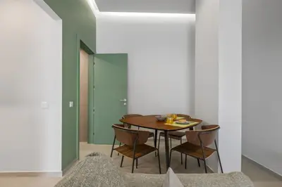 a dining room with a table and chairs at Studio Palace A by Homie in Funchal