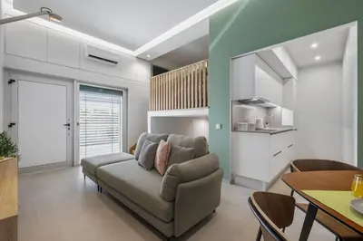 a living room with a couch and a table at Studio Palace A by Homie in Funchal