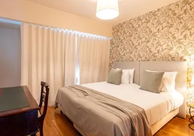 a city with a cruise ship in the water at Funcho 91, cozy apartment in the heart of the city in Funchal