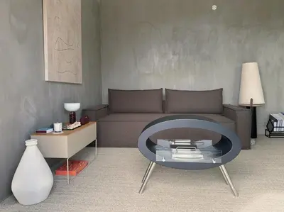a living room with a couch and a table at NEW! casa L, ocean view private pool Villa in Ponta do Sol