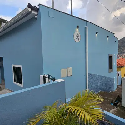 a bathroom with a shower with a glass door at JoLi Larano - BBQ In in Machico