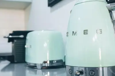 two blenders sitting on a counter in a kitchen at Funchal City Yellow Townhouse and Terrace in Funchal