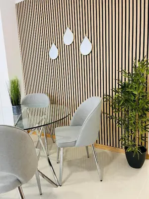 a room with three chairs and a table with plants at Carreira Vicente by Olá Madeira in Funchal