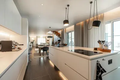 a living room with a view of the ocean at Belo Horizonte in Estreito da Calheta