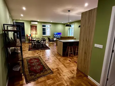 a living room with a kitchen and a dining room at Apartment Minorca 2 in Funchal