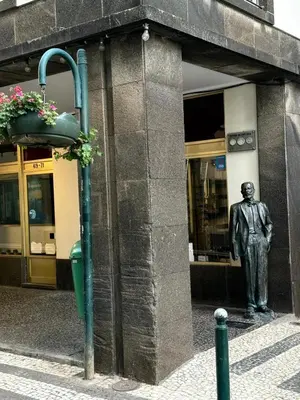 a statue of a man in front of a building at Apartment Minorca 2 in Funchal