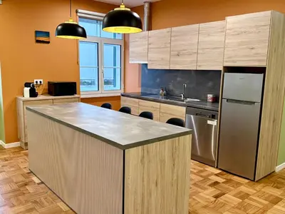 a kitchen with a counter top and a refrigerator at Apartment Minorca 2 in Funchal