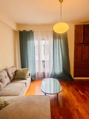 a living room with a couch and a glass table at Carreira Dreamscape - 3 bedrooms in Funchal