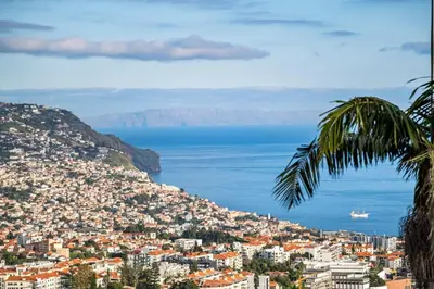 a view of the city of positano and the ocean at Flory House by ALMA Holiday Rentals in Funchal