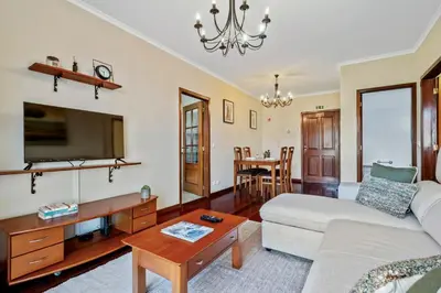 a living room with a couch and a table at Our Nest by ALMA Holiday Rentals in Caniço