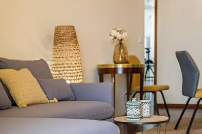 a living room with a couch and a table at Nata7 Apartment in Funchal