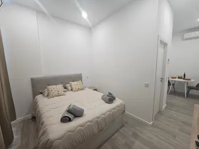 a bedroom with a bed with pillows on it at Faty`s Place by Susys Holidays in Santa Cruz