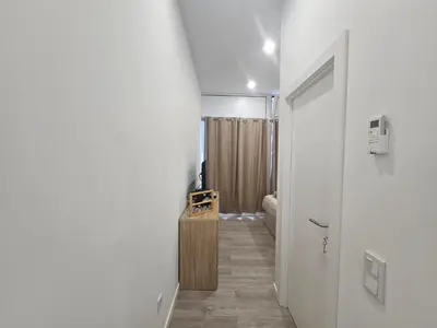 a hallway leading to a bathroom with a shower at Faty`s Place by Susys Holidays in Santa Cruz