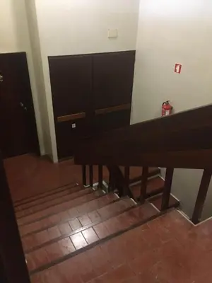 a staircase with a piano in a room at Crystal Madeira Studio in Funchal