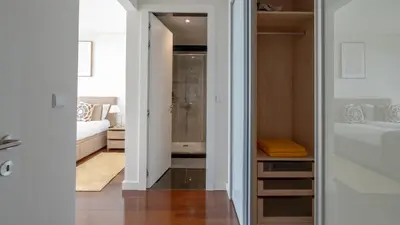 a bathroom with a shower and a sink at Bogi's APT by LovelyStay in Funchal