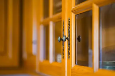 a close up of a wooden door with a glass at GuestReady - Machico Apartment with Balcony in Machico