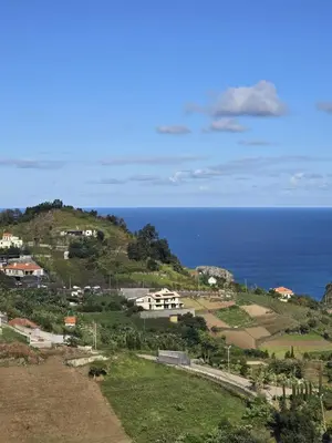 a view of the ocean from a hill at Casa Rosa in Porto da Cruz