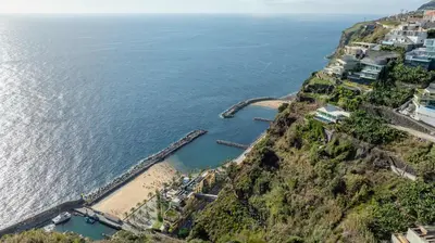 an aerial view of a beach and the ocean at Villa CLIFF HEAVEN HOUSE in Calheta
