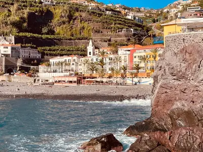 a view of a beach with a group of buildings at Sunny Escape - Ponta do Sol - Vila Silva Downstairs in Ponta do Sol