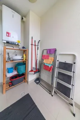 a kitchen with a shelf and a ladder in a room at Gorete Apartment 3 by Mth in Funchal