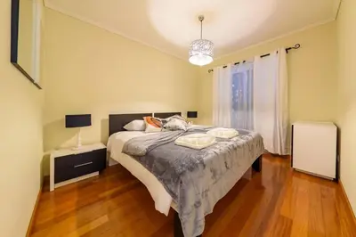 a bedroom with a bed with two pillows on it at Gorete Apartment 3 by Mth in Funchal