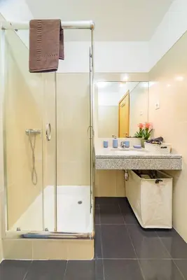 a bathroom with a shower and a sink at Gorete Apartment 3 by Mth in Funchal