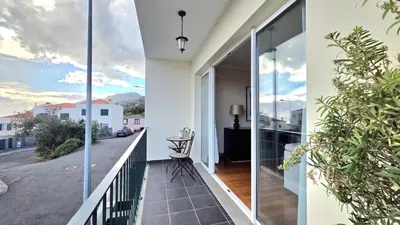 a balcony with a view of a street at Atlantic Breeze in Câmara de Lobos