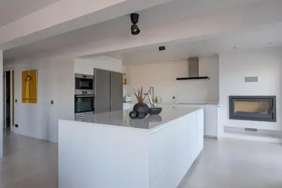 a kitchen with white walls and a white counter top at Villa Lázaro By Holiday Rental Madeira in Funchal