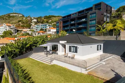 an aerial view of a house with a roof at Villa Favila by Madeira Dream Stays in Funchal