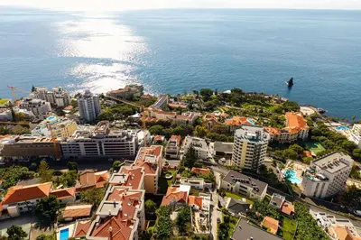 an aerial view of a city next to the ocean at Villa Favila by Madeira Dream Stays in Funchal