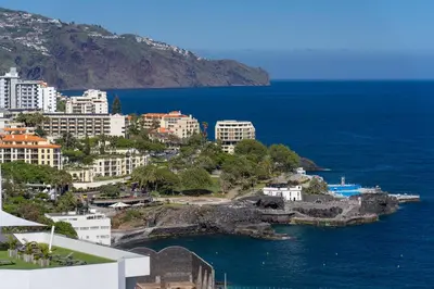 an aerial view of a city and the ocean at Diego Cruz Penthouse by Holiday Rental Madeira in Funchal