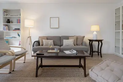 a living room with a couch and a coffee table at Baía II by An Island Apart in Funchal