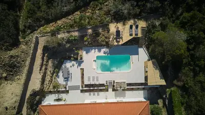 an overhead view of a house with a swimming pool at Villa Hideaway - Splendid Sea View with a Pool in Aljezur