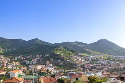 a view of a city with mountains in the background at Villa Machico Valley Flat 2 in Machico