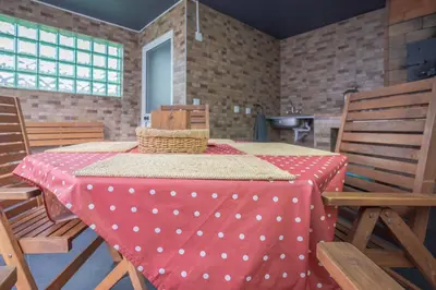 a table with a red and white polka dot table cloth at Villa Machico Valley Flat 2 in Machico